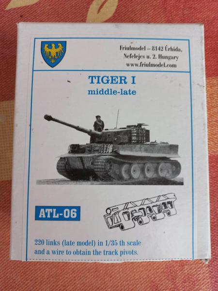 Tiger I

 Dragon 6253 - Tiger I Late Production + Atak 35032 Zimmerit + 35A02 - 2m antenna for military vehicle + 35A15 - German aerial mount + 35B71 - 8,8cm KwK 36 L/56 steel barrel + 35D09 - Metal Bucket + ER-3502 - Towing cable and mount + Griffon Model L35A141 - Exhaust + Voyager PE35070 - Fenders + Friulmodel ATL-06 Track ------ 43.000 Ft