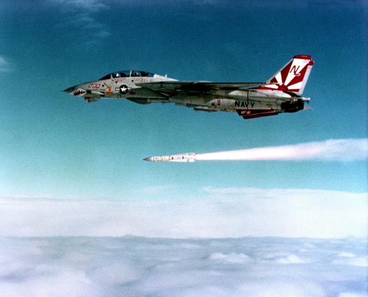 A U.S. Navy Grumman F-14A Tomcat from the fighter squadron VF-111 Sundowners launches an AIM-54C Phoenix long-range air to air missile in 1991......